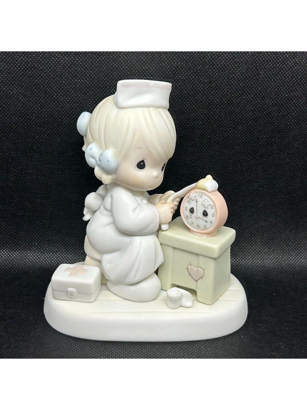 Precious Moments "Time Heals"  figurine